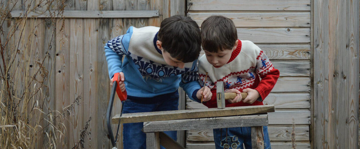 Kids building with wood