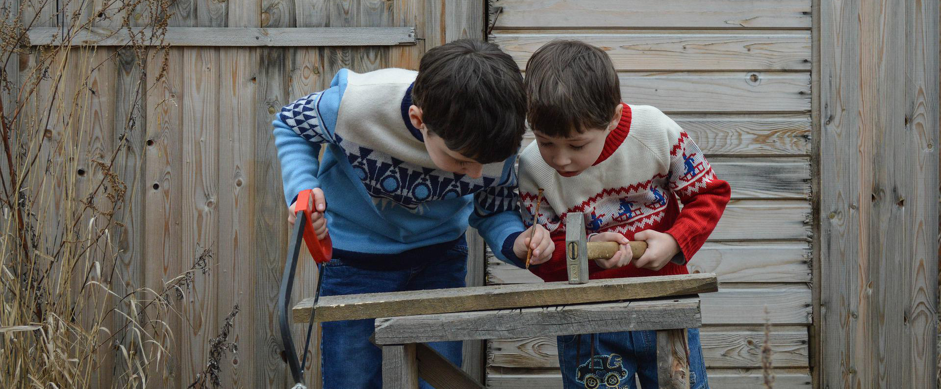 Kids building with wood
