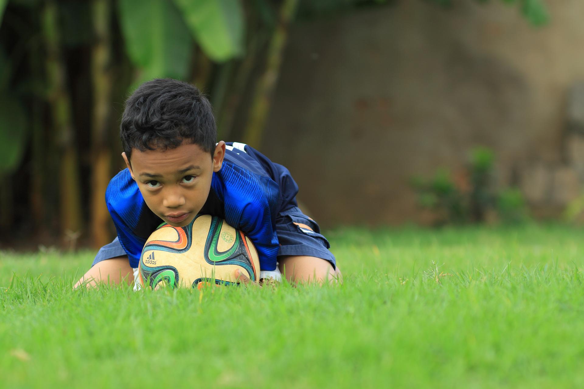 Kid With A Soccer Ball