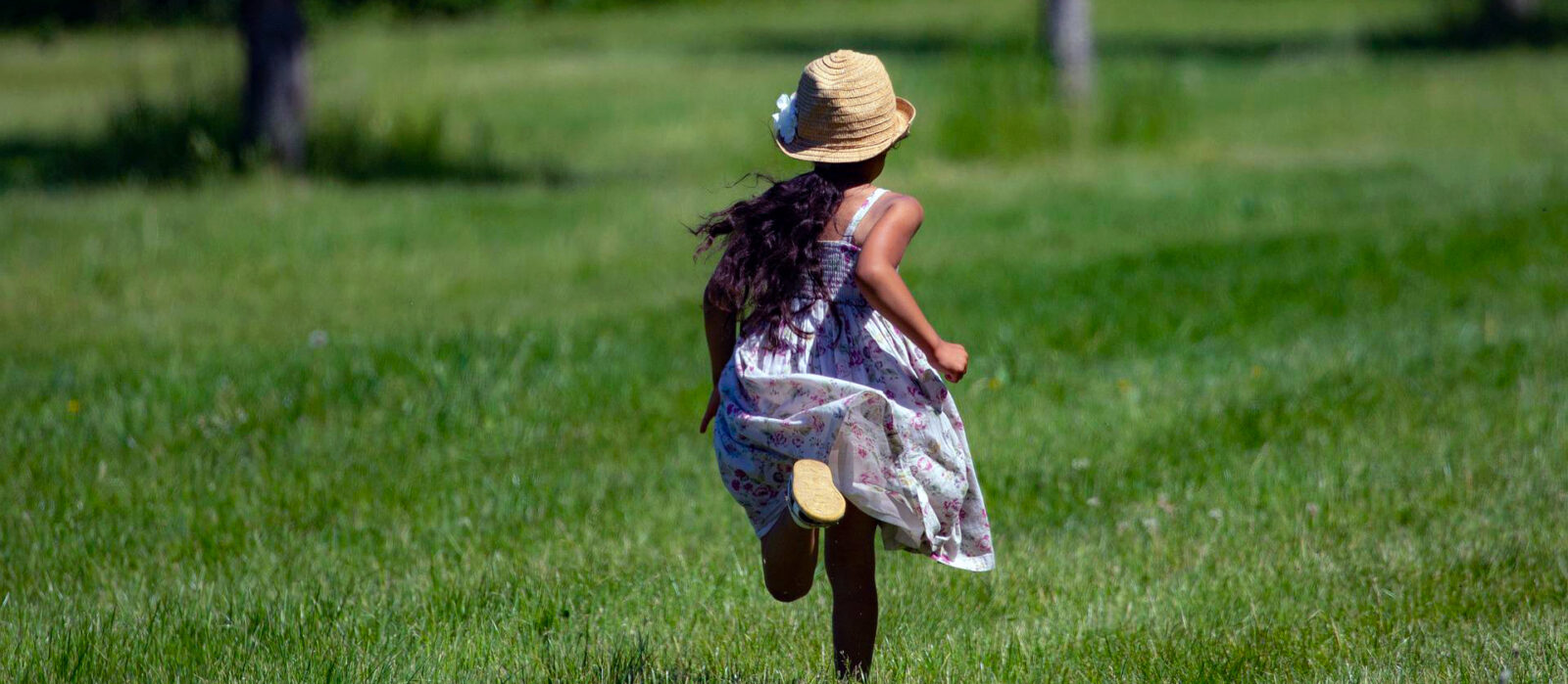Child running in grass