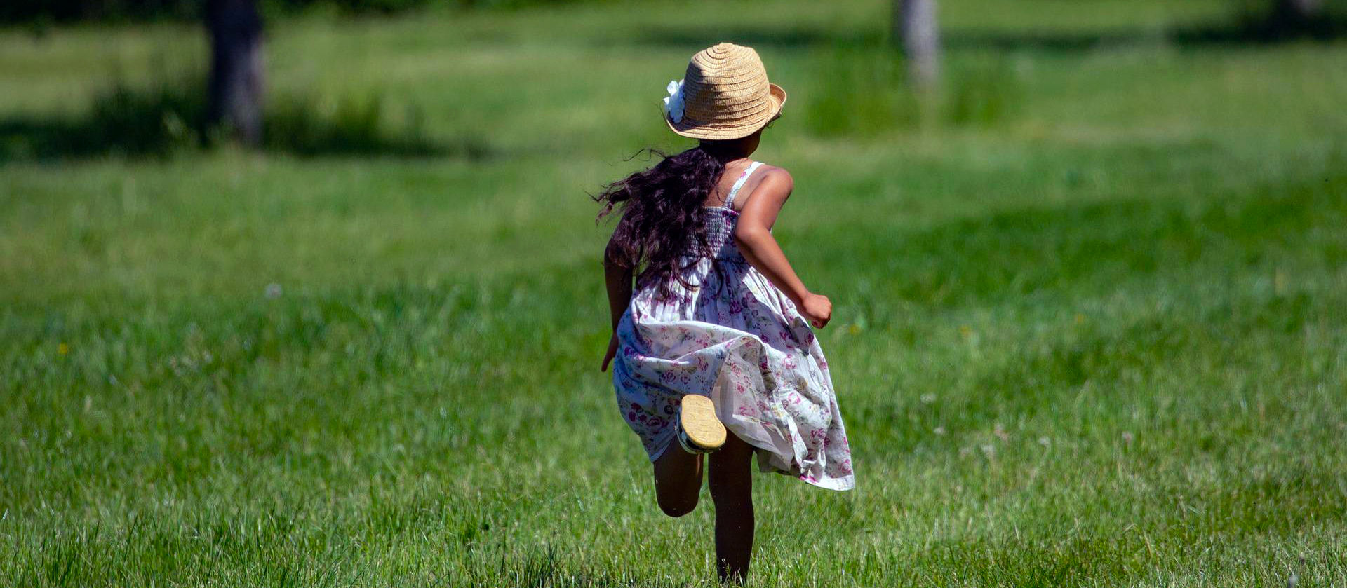 Child running in grass