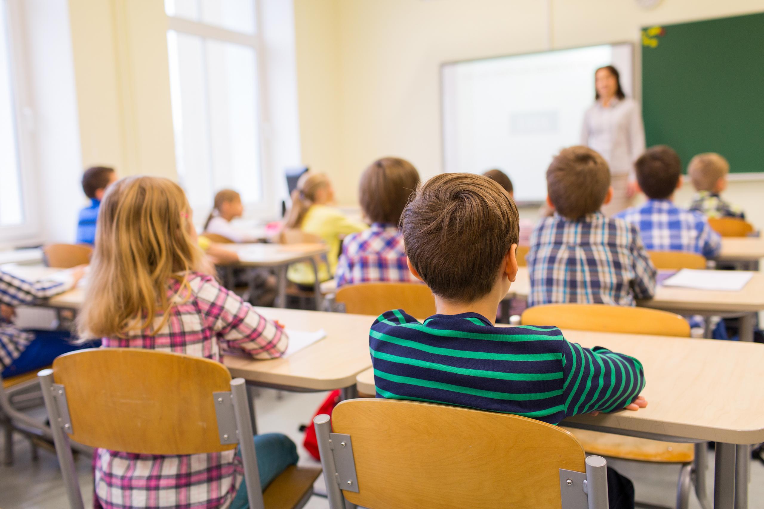 kids listening intently to their teacher