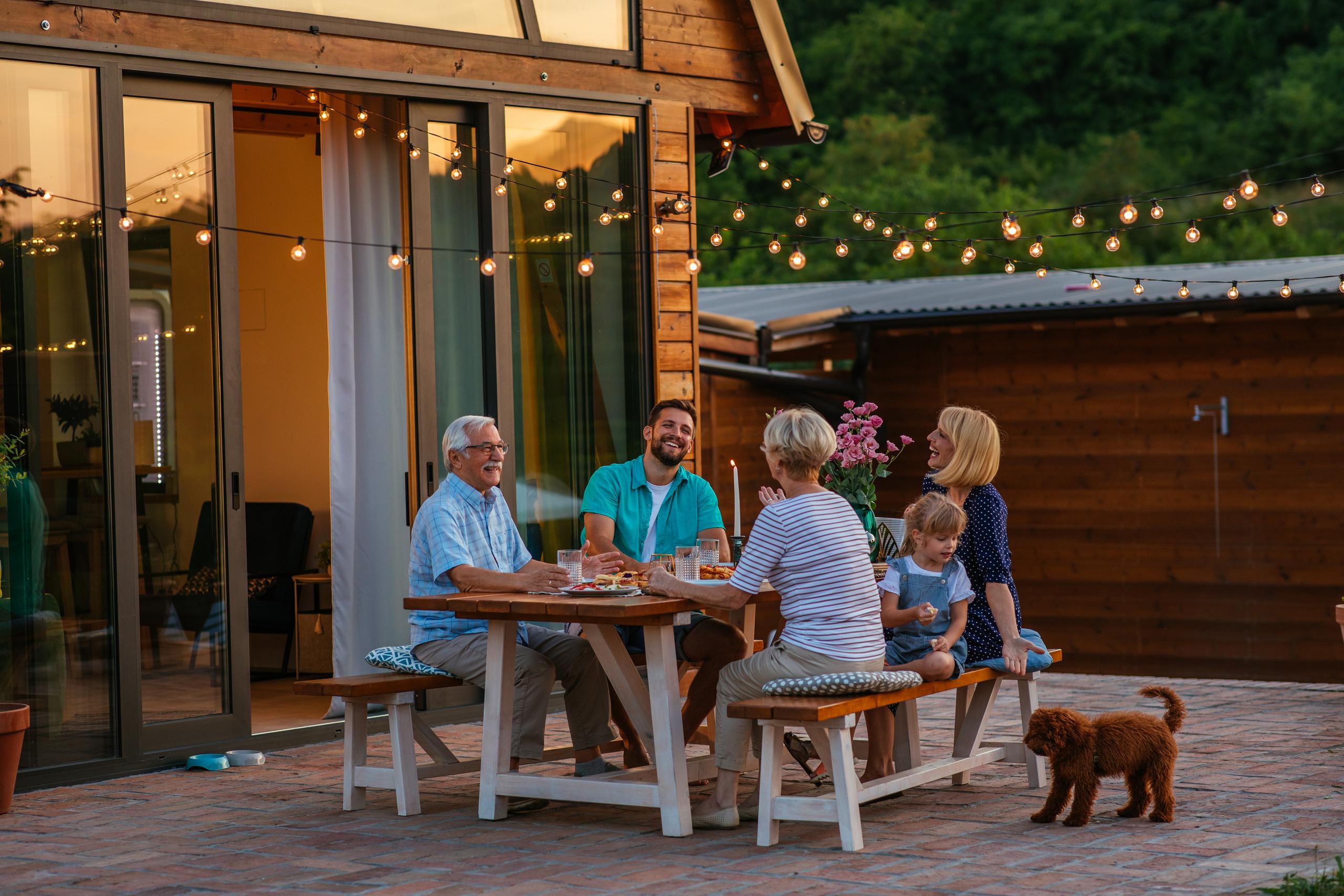 family dining on deck